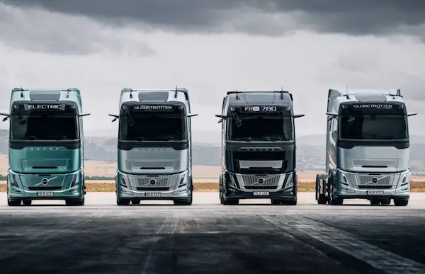 fleet of modern white freight trucks lined up at a European logistics company headquarters